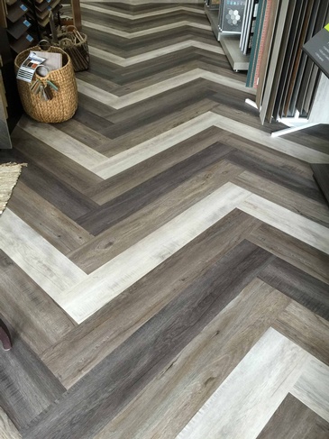 Chevron Hardwood Flooring Burnaby by DMC Surfaces Outlet