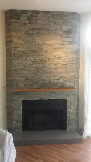 Modern Natural Stone Hearth Installation by DMC Surfaces Outlet