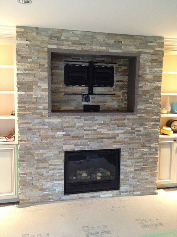 Modern Natural Stone Hearth and Partition Wall Installation by DMC Surfaces Outlet