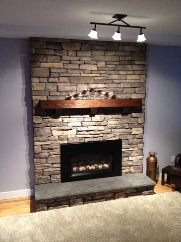 Natural Stone Hearth Wall Installation by DMC Surfaces Outlet